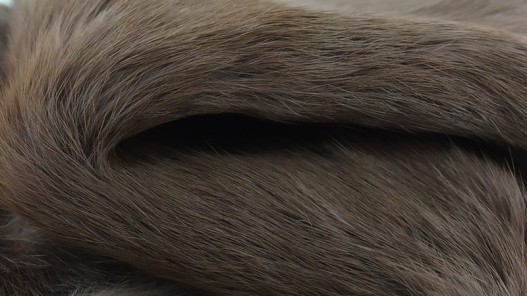 Peau de lapin en fourrure - poil gris taupe - Cuir en Stock