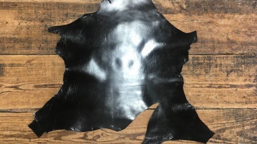 peau de cuir de chevreau noir glacé maroquinerie reliure accessoire cuir en stock