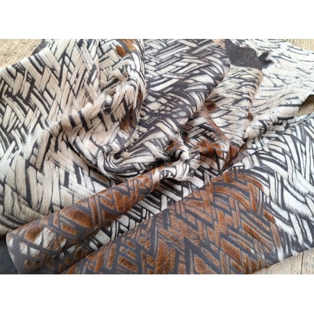 demi peau - vache - poils tachetés - chevrons - maroquinerie - vêtement - cuirenstock