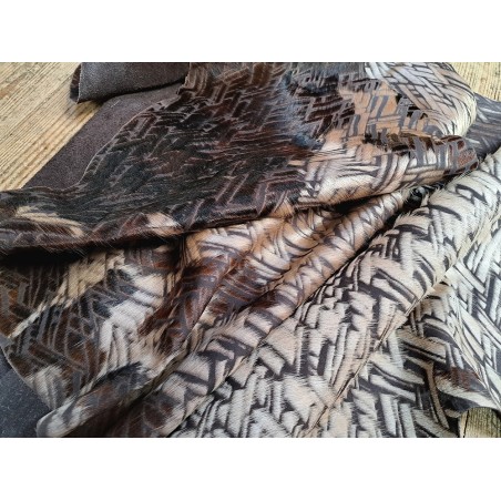 demi peau - vache - poils tachetés - chevrons - maroquinerie - vêtement - cuirenstock