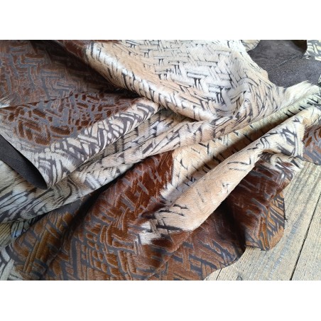 demi peau - vache - poils tachetés - chevrons - maroquinerie - vêtement - cuirenstock